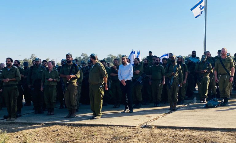 Rabbi Havlin in prayer at the rabbinic military course