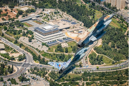 The German Air Force plane next to the Israeli Air Force plane above the Knesset
