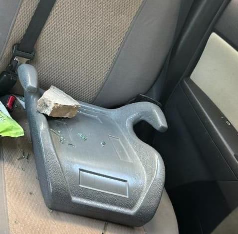 The picture of the damage to a car as a result of the throwing of stones in Abu Tor 