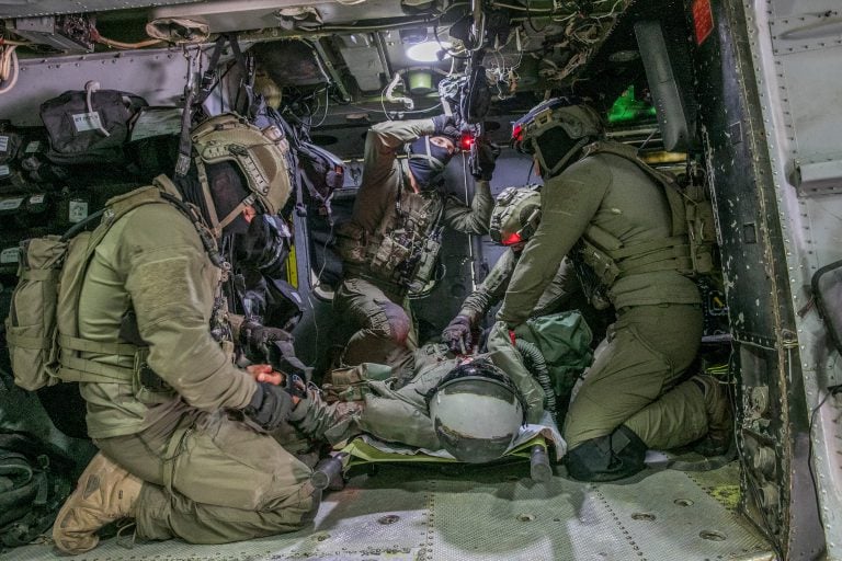 Evacuation the wounded. Illustration.