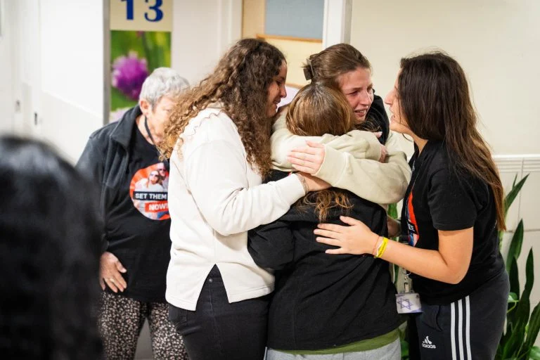With Tears and Hugs: Raz Meets her Daughters after Hamas Captivity