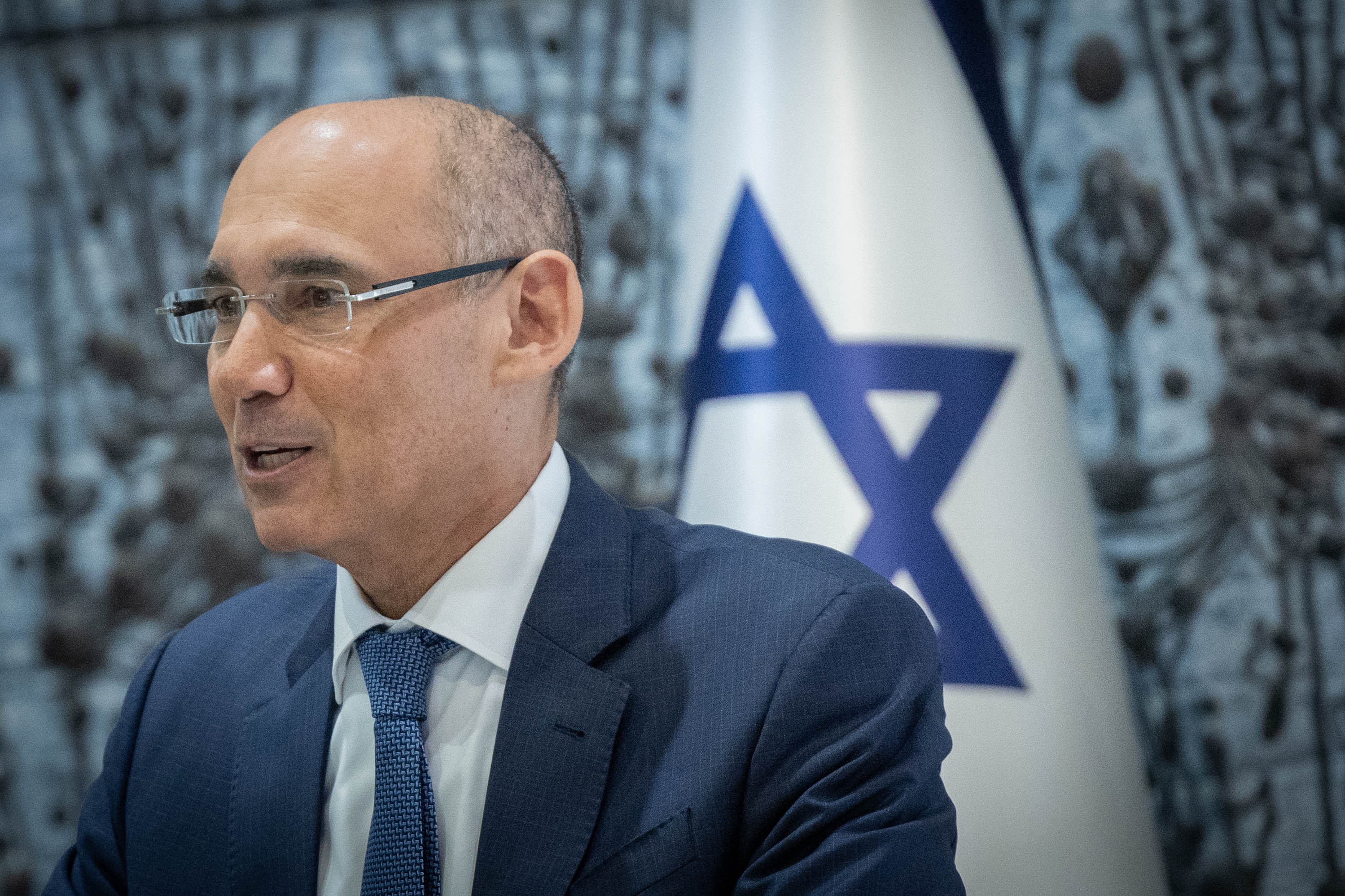 Cutting rates amid cautious optimism about the Israeli economy.