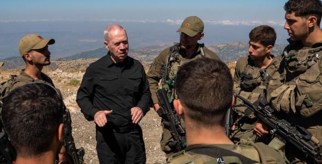 Gallant talks to the troops.