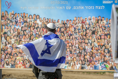 Israeli border police officers visit the site of the Nova music festival massacre