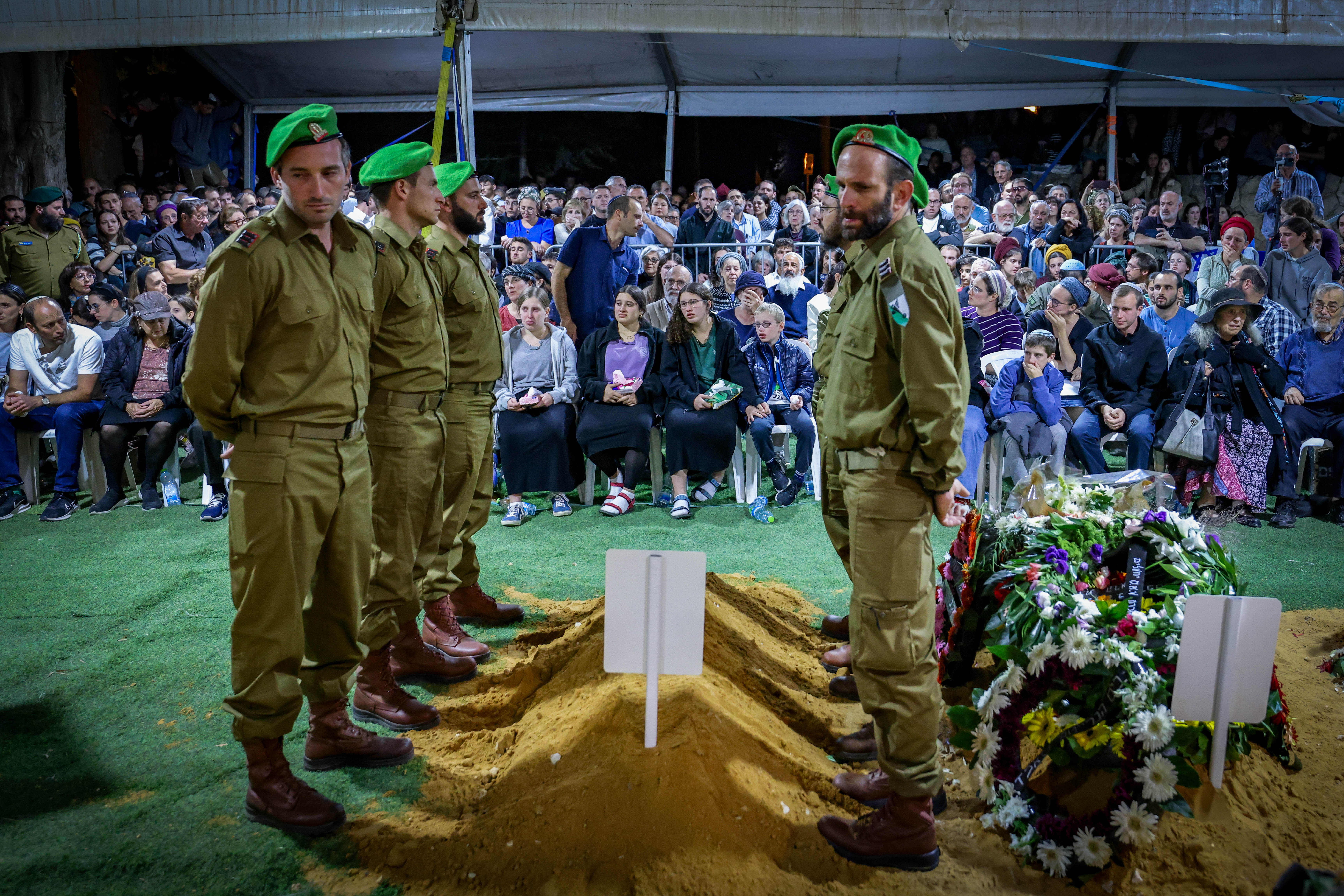 Family and friends of Israeli soldier Captain (res.) Avraham Yosef Goldberg, attend his funeral at Mount Herzl Military Cemetery in Jerusalem on October 27, 2024. He fell in battle in southern Lebanon.