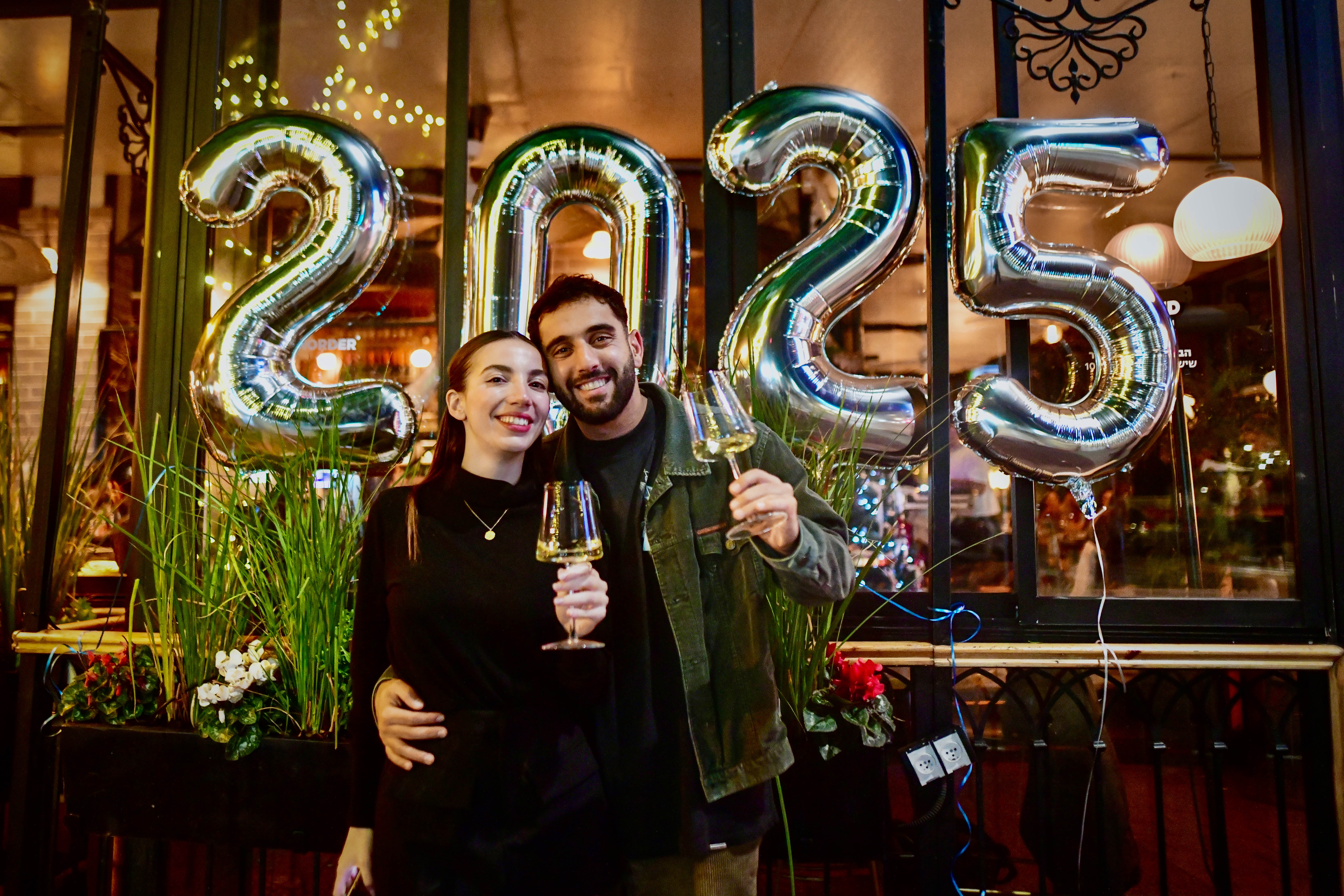 Israelis celebrating the new year on New Year's Eve, at a Pub in Tel Aviv, December 31, 2024.