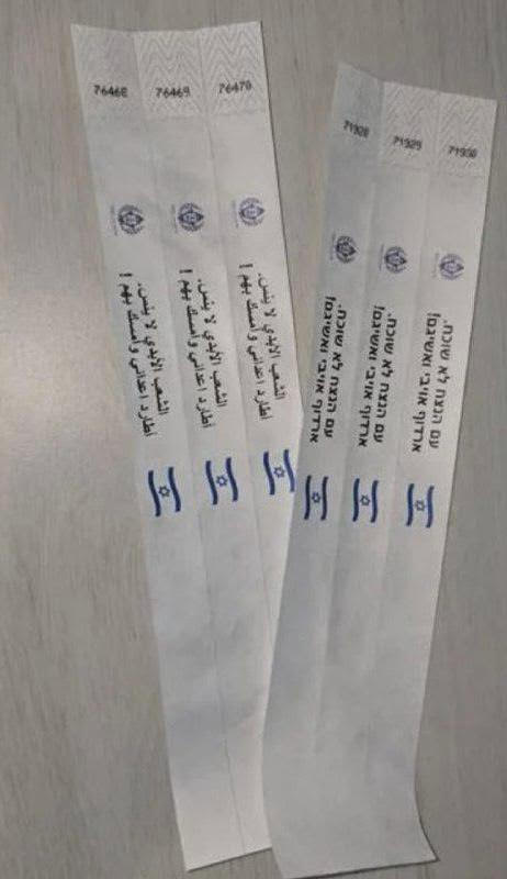 Copies of the wristbands given to the released terrorists