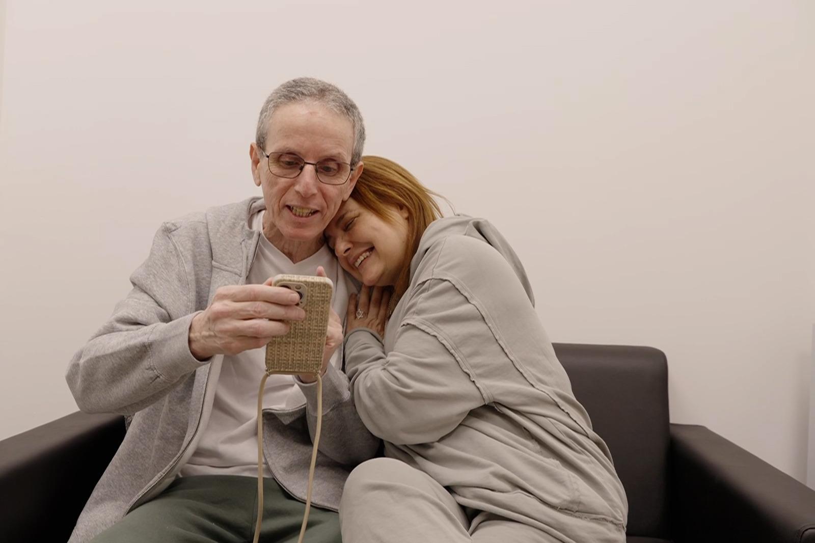 In color: Freed hostage Ohad Ben Ami reunites with his wife and daughters – and our hearts are so full