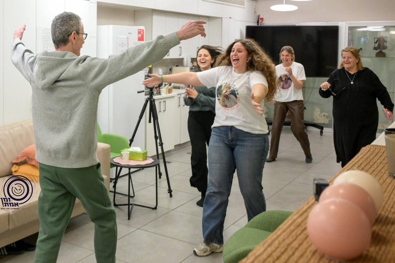 In color: Freed hostage Ohad Ben Ami reunites with his wife and daughters – and our hearts are so full