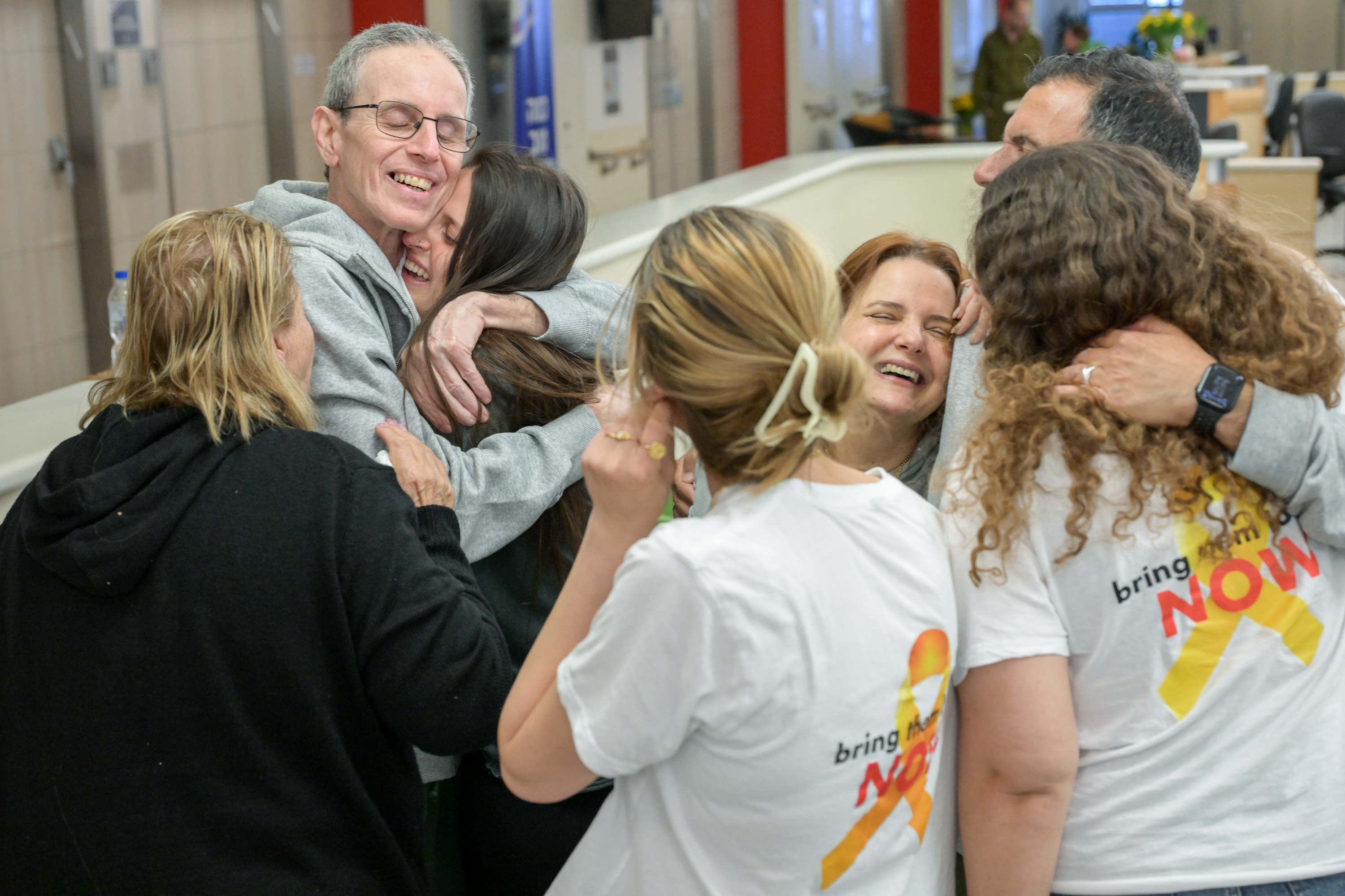 In color: Freed hostage Ohad Ben Ami reunites with his wife and daughters – and our hearts are so full