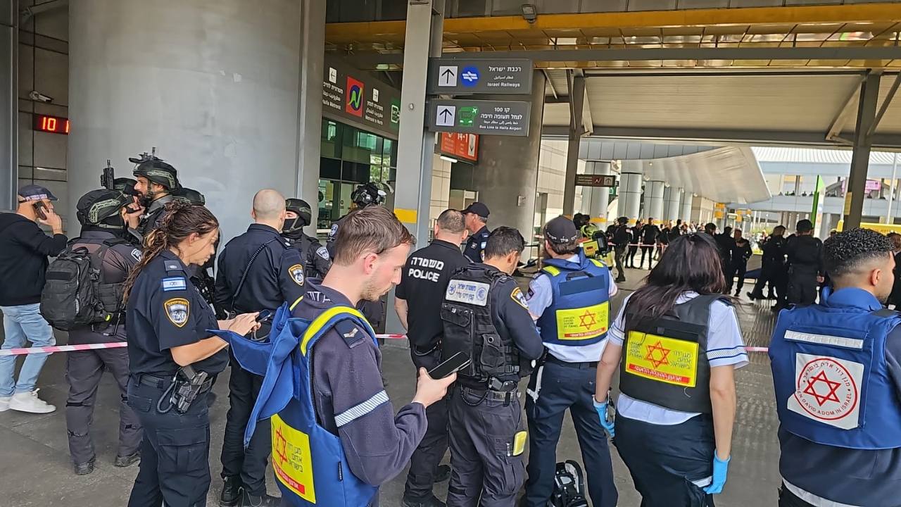 Security forces and rescue workers at the scene of the stabbing and shooting attack, March 3, 2025