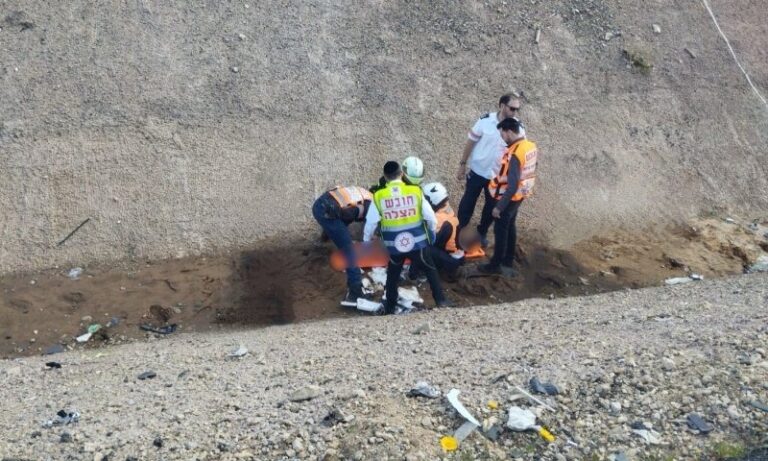United Hatzalah with the injured woman following the attack