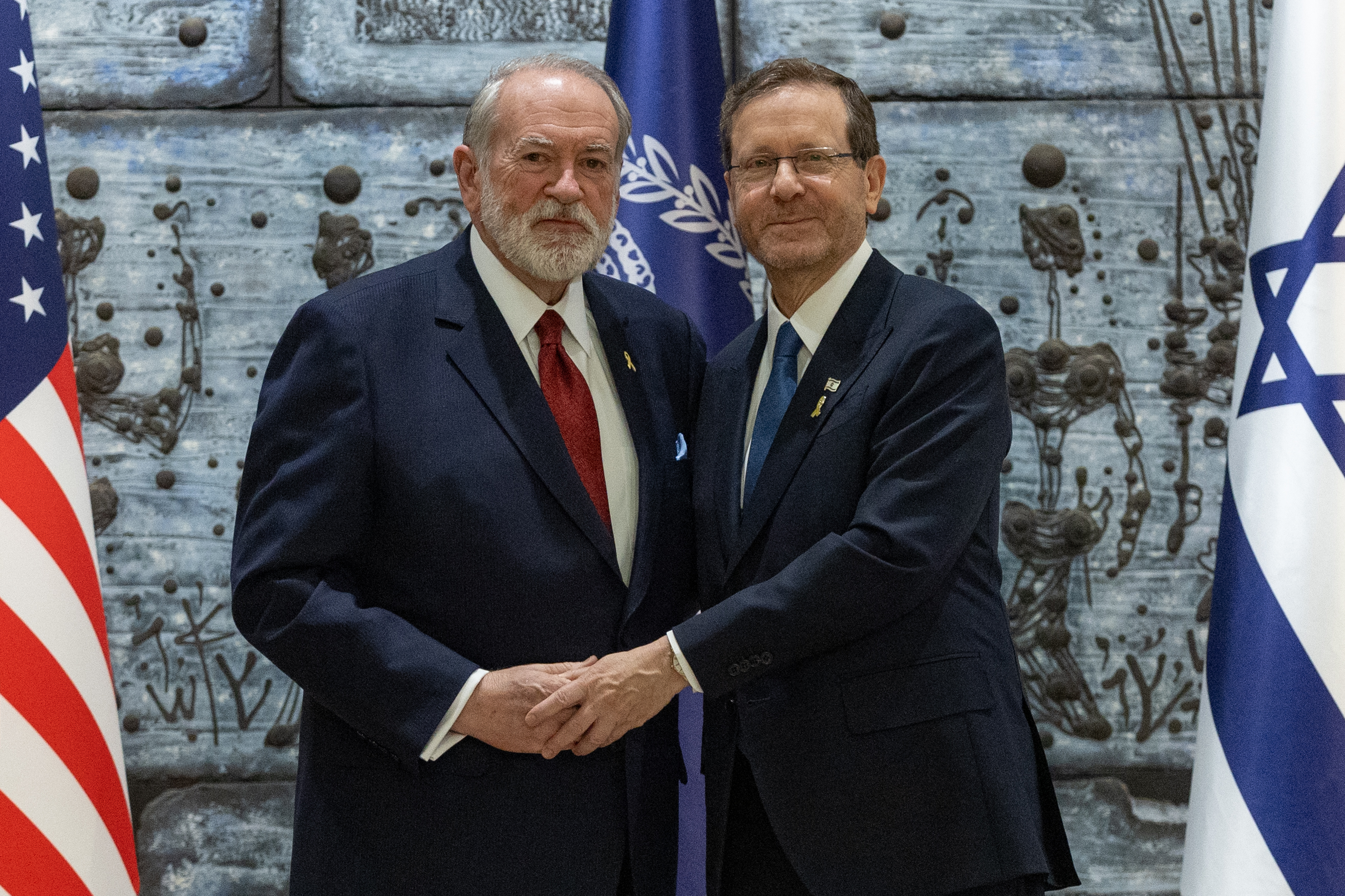 Huckabee and Herzog.