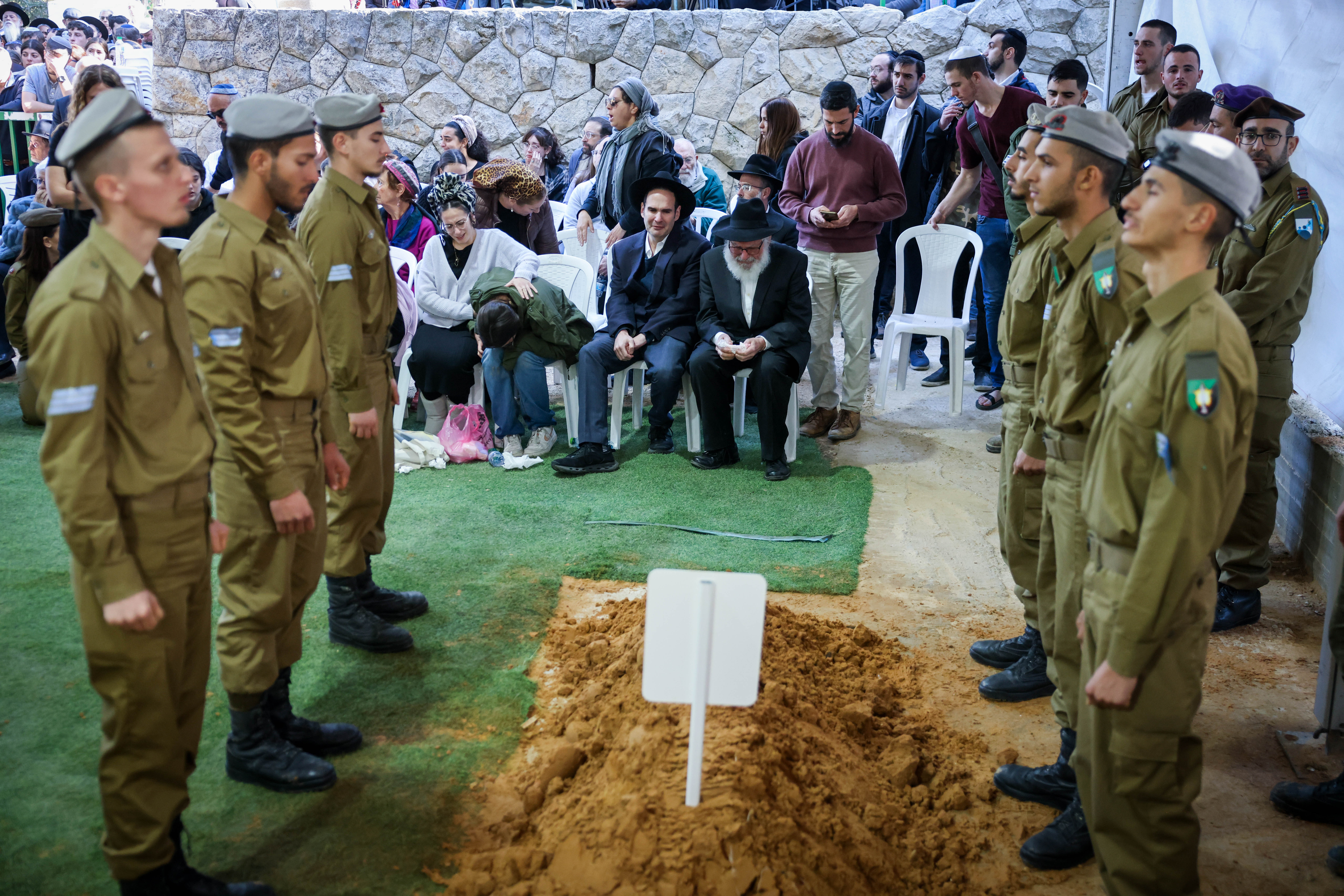 Family and friends of Israeli soldier Staff Sergeant Zamir Burke attend his funeral at Mount Herzl Military Cemetery in Jerusalem on December 1, 2024. He fell in battle in the Gaza Strip. 