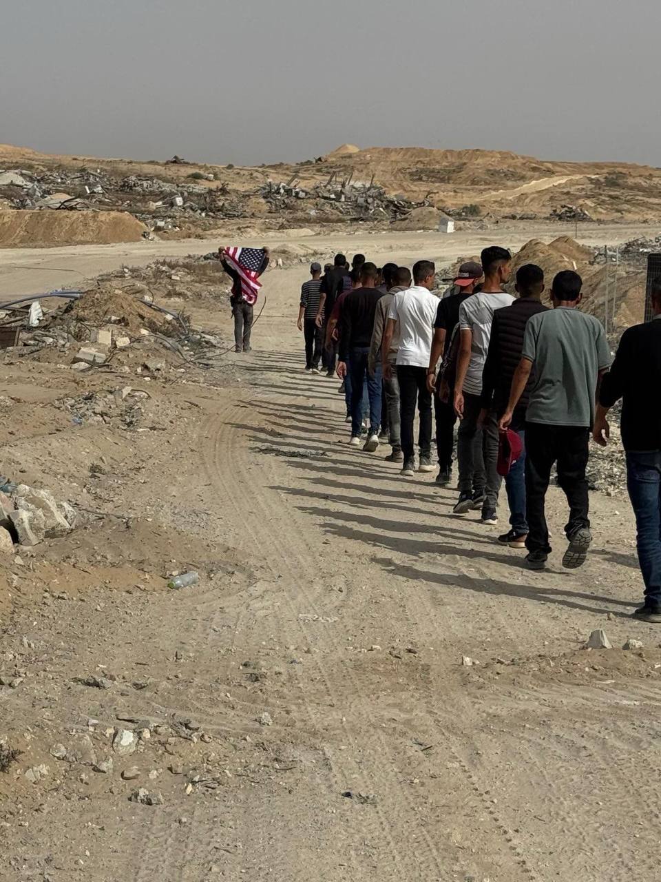 A Gazan waving the US flag, Rafah, May 27th, 2025