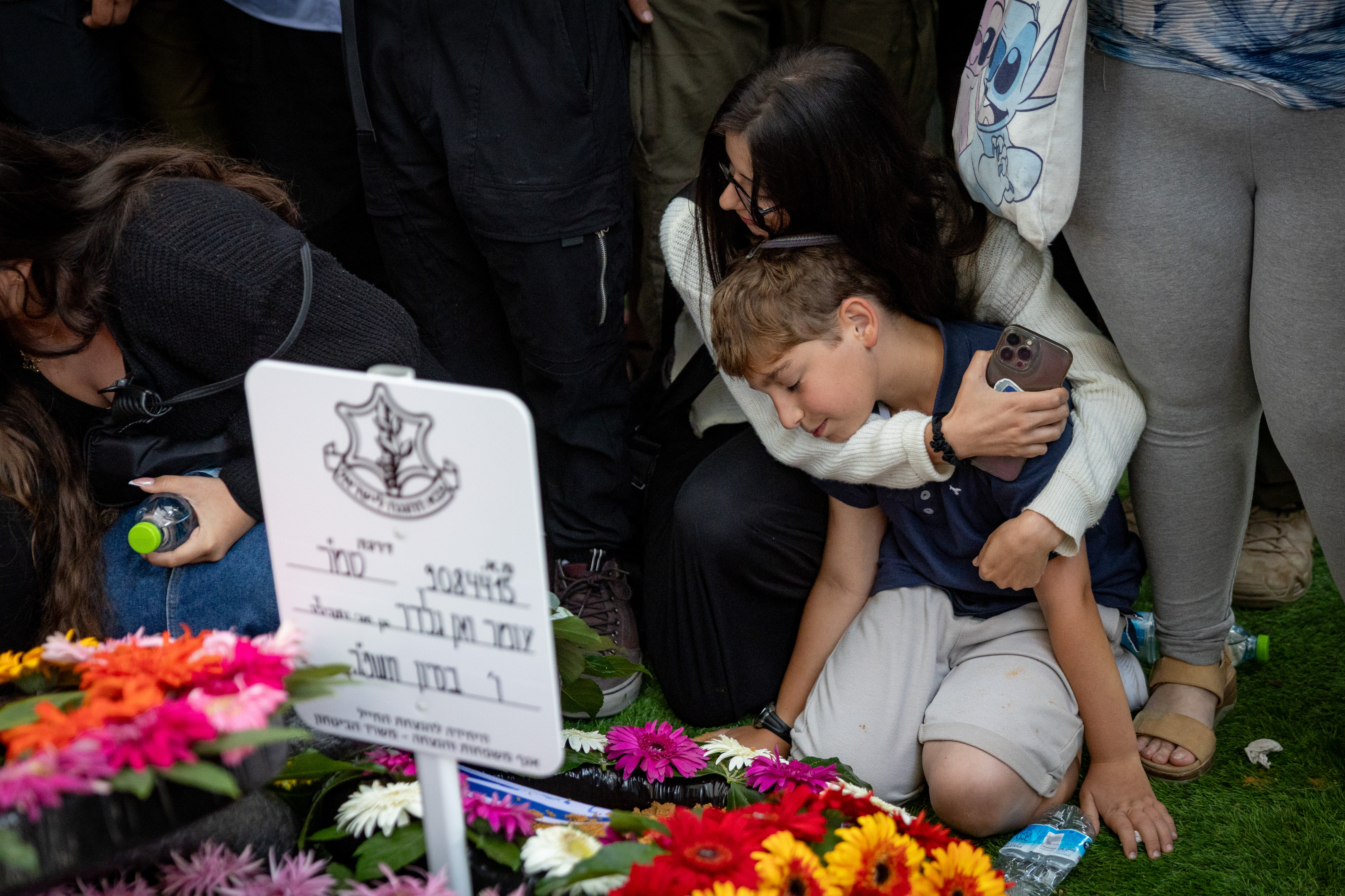 Family and friends of Israeli soldier Staff sergeant Omer Van Gelder attend his funeral at the Mount Herzl Military Cemetery in Jerusalem on June 3, 2025. He was killed in combat in the Gaza Strip.