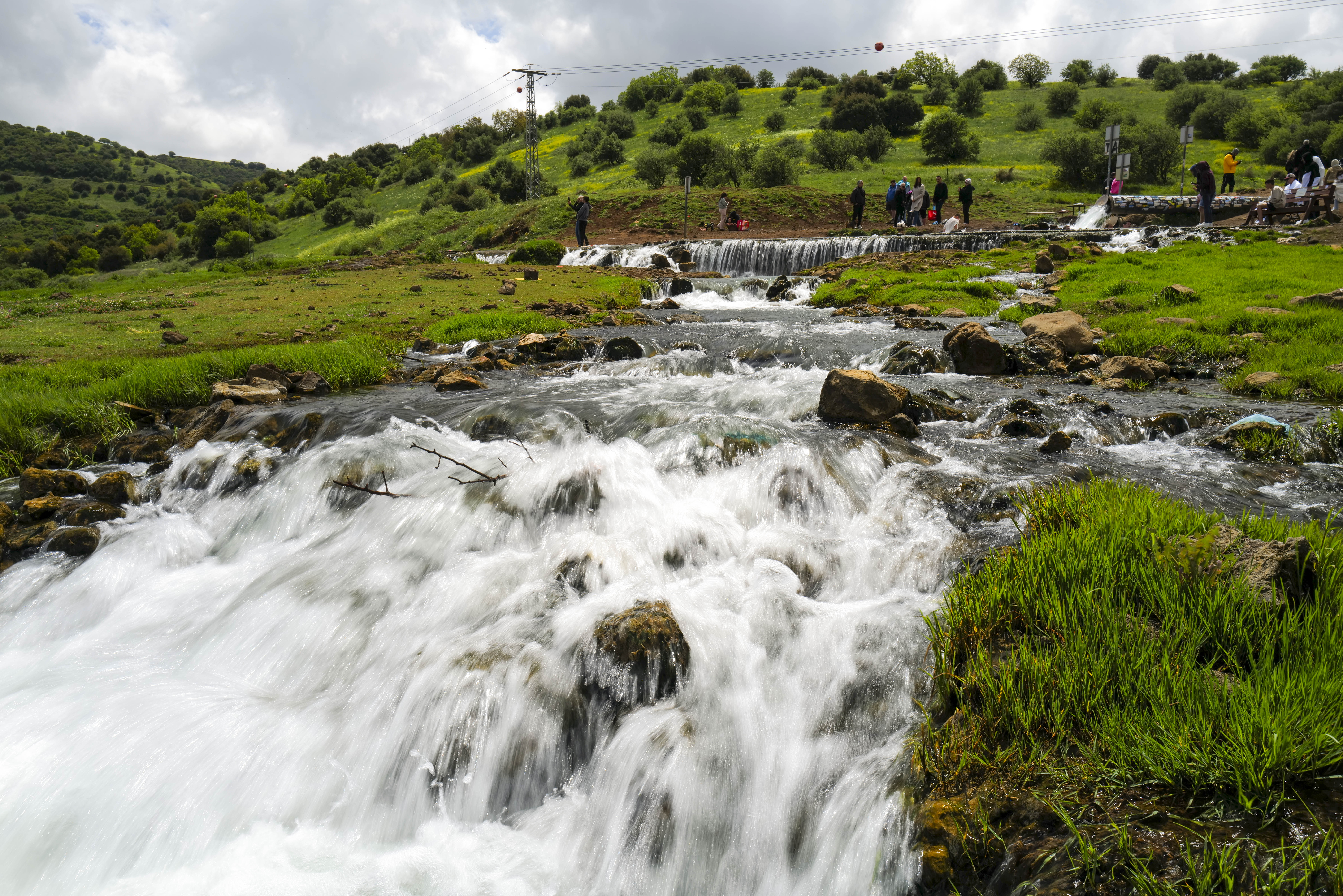 Israeli families view the Golan Heights from the top of Mount Bental