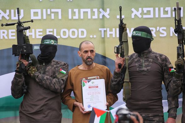 Former hostage Eli Sharabi being released by Hamas in a hostage deal with Israel