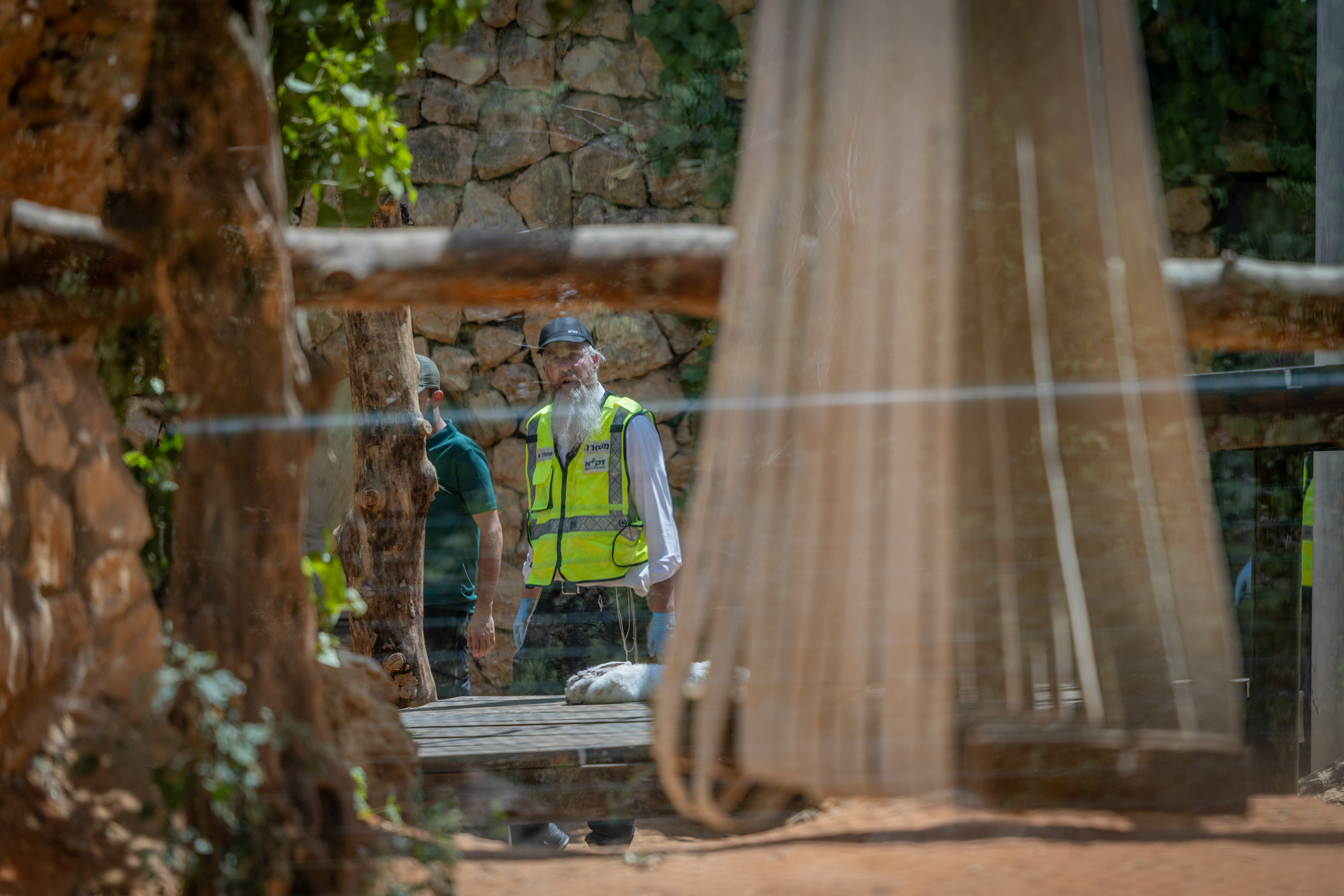 Workers and rescue forces at the scene where 26-year-old Uriel Nuri, the head tiger keeper at the Jerusalem Biblical Zoo, was killed by a tiger on August 1, 2025. 