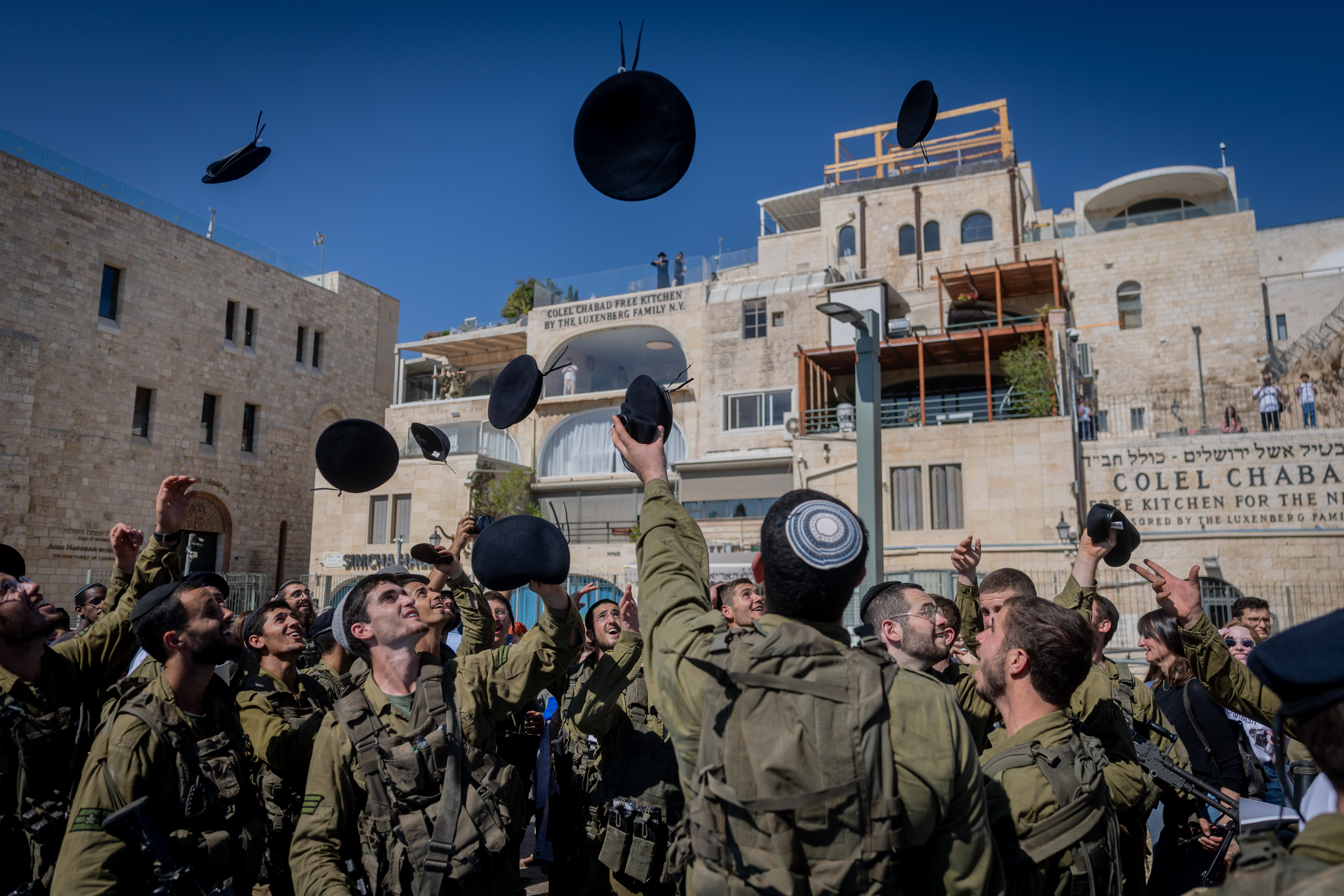 Ultra orthodox jewish soldiers from the Hasmonean Brigade take part in a beret march after completing seven months of basic and advanced training