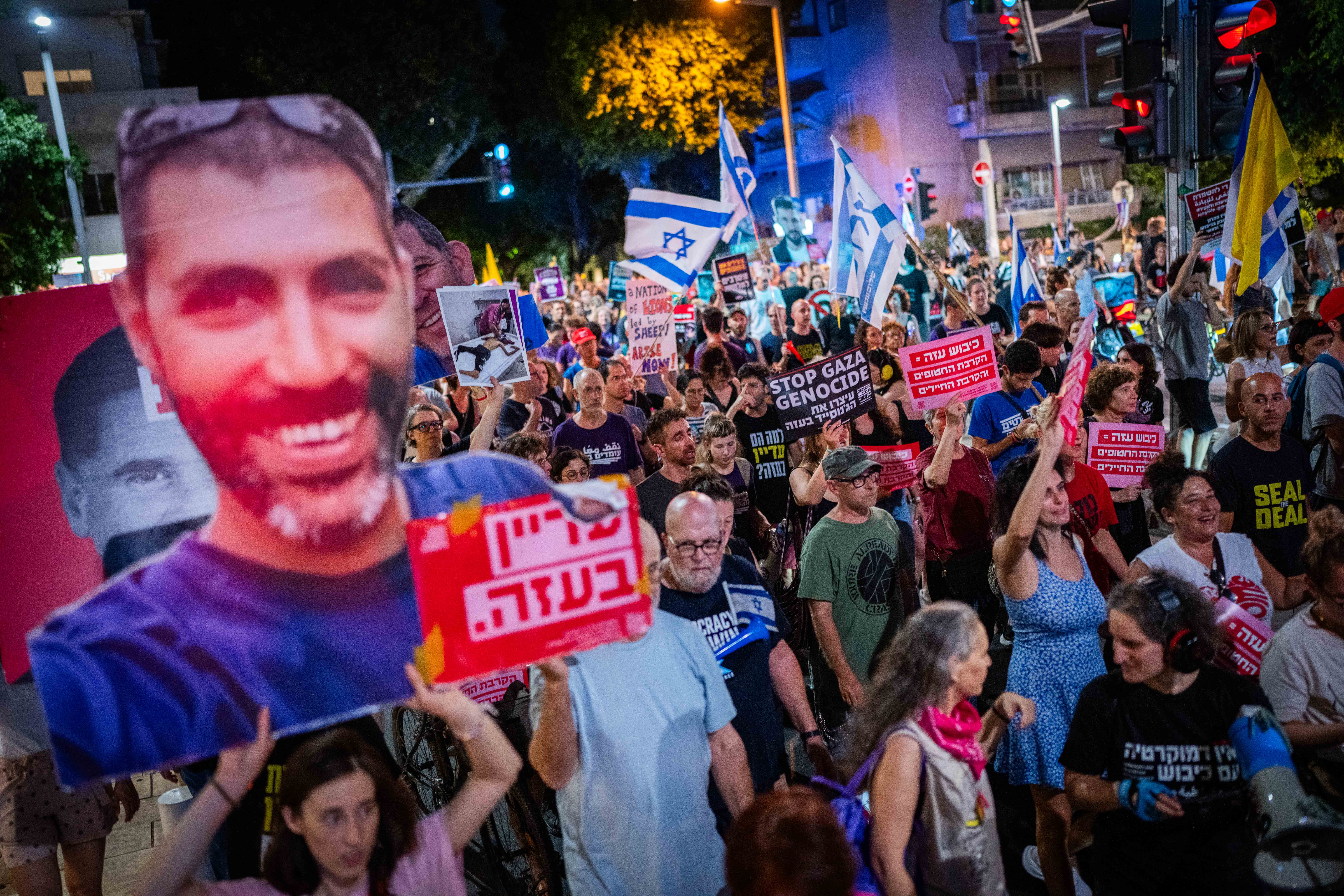 sraelis attend a protest calling for the end of the war in Gaza and the release of all Israeli hostages, in Tel Aviv. August 7, 2025.