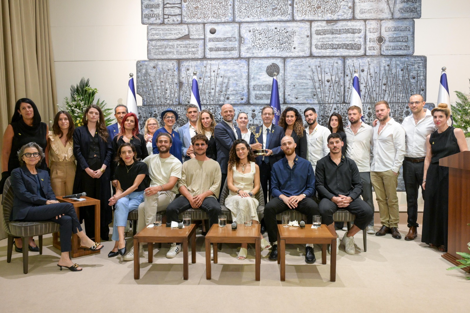 Herzog with the filmmakers and families of October 7 victims.