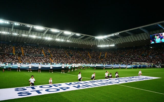 UEFA Banner Sparks Israeli Anger: “Where Were You on October 7”
