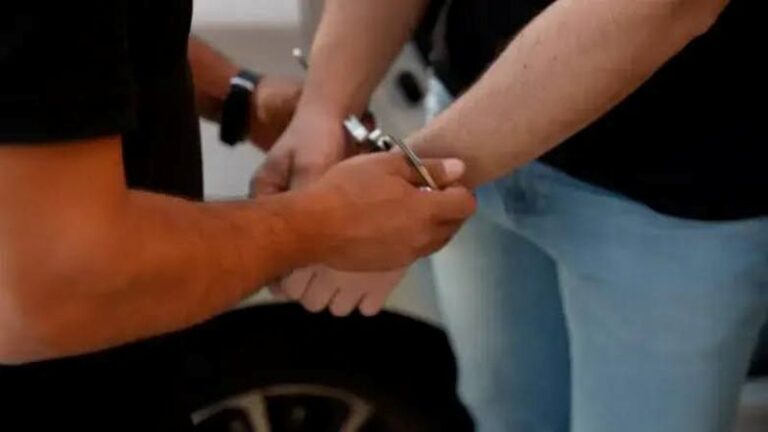 Woman being arrested