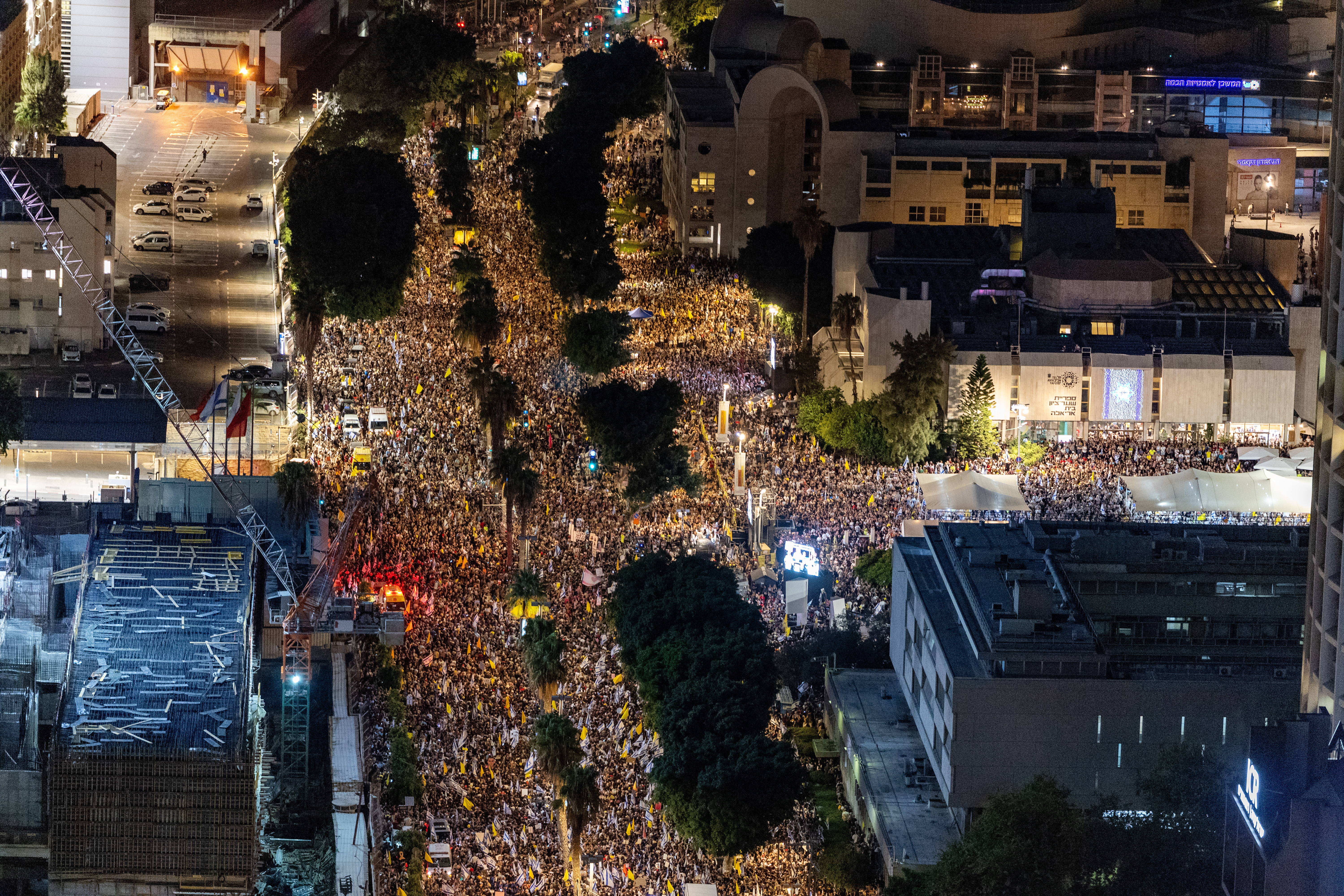 People gather at Hostage Square in Tel Aviv during a rally calling for the release of hostages held in Gaza, August 17, 2025. 