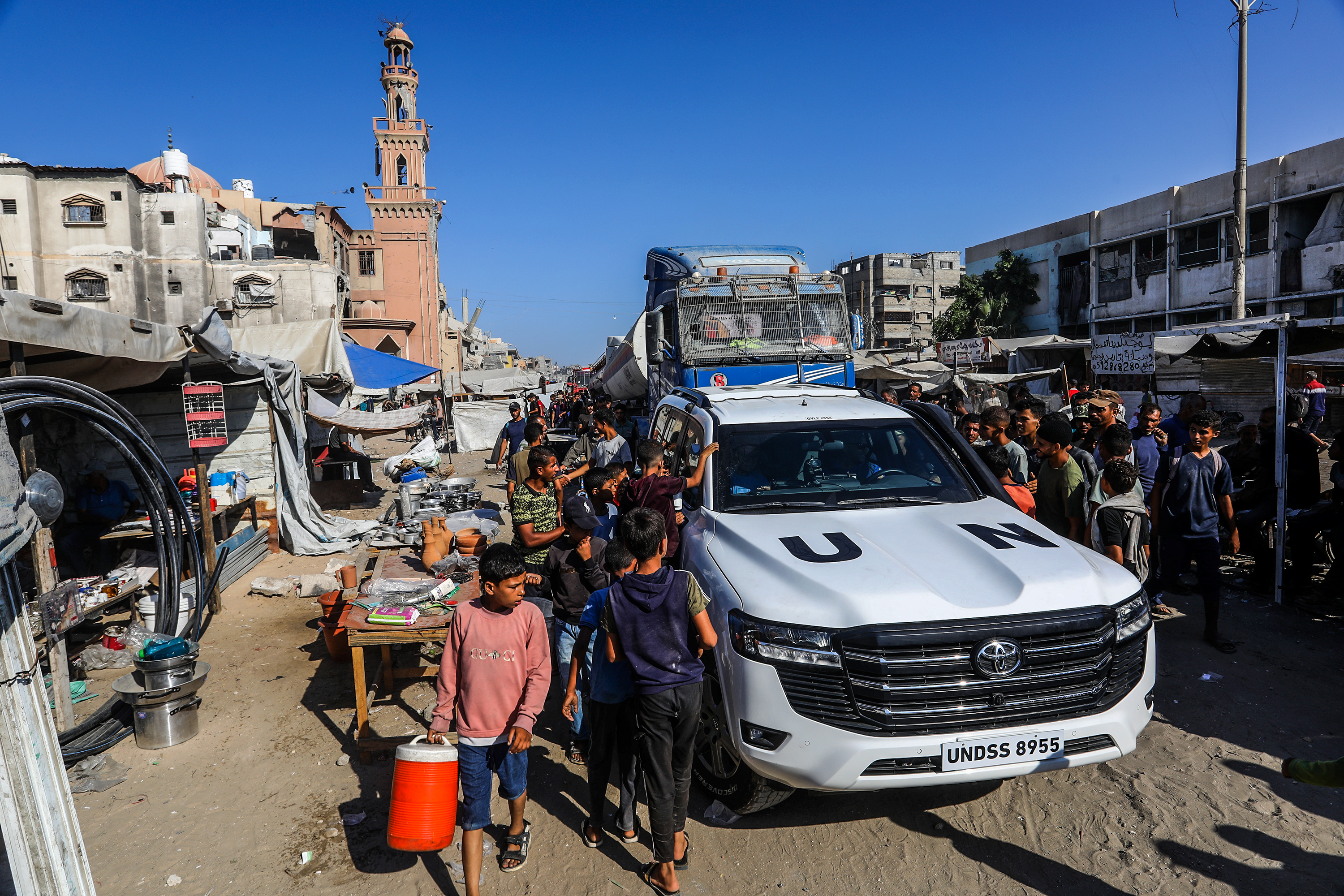 UN trucks preparing to bring in aid.