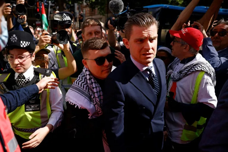 Irish rap group Kneecap singer, Liam O'Hanna center, who performs under the stage name Mo Chara, face judgement for supporting Hezbollah