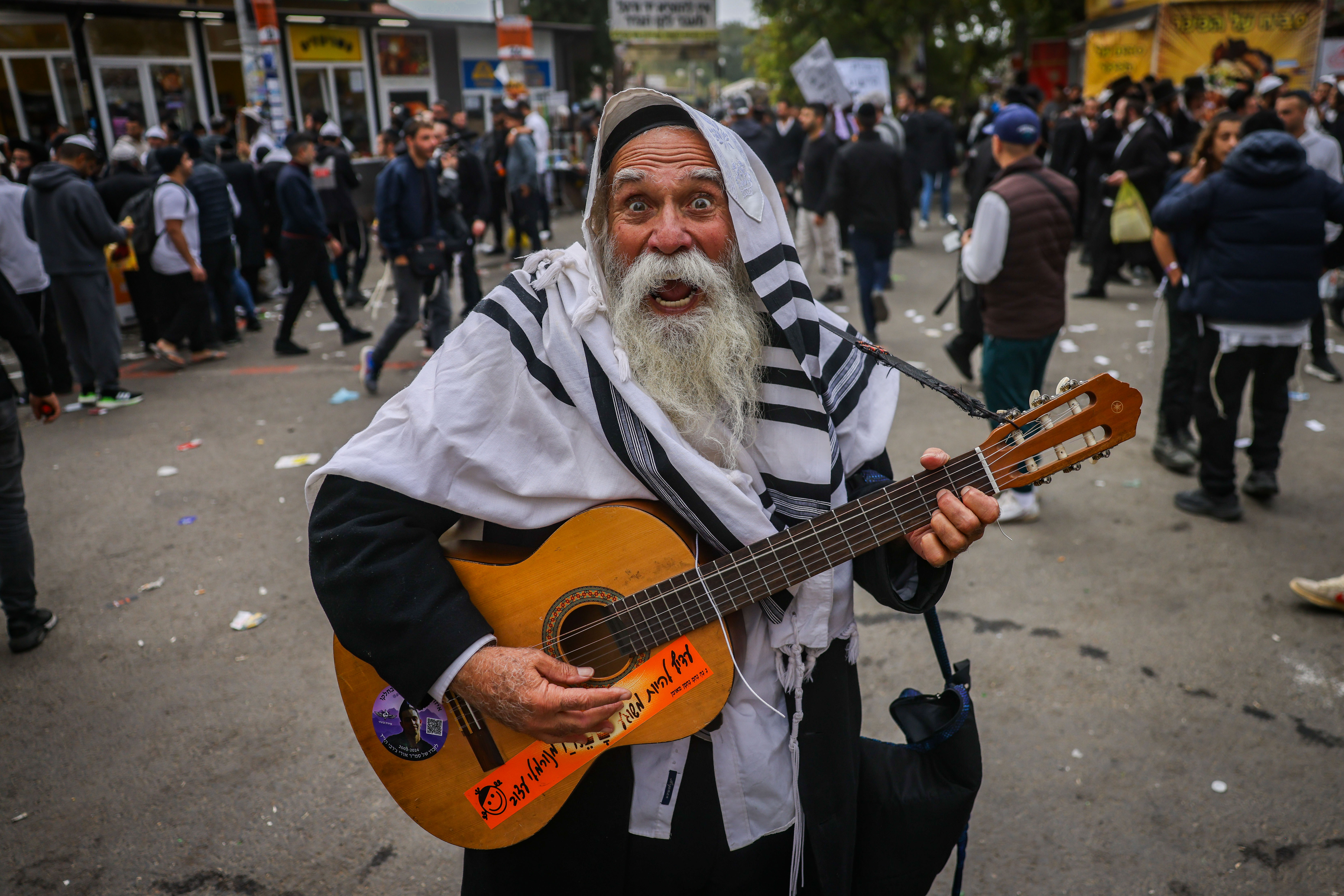 Jewish men in the street during Tikkun HaKlali near the tomb of Rabbi Nachman of Breslov in Uman, on eve of the Jewish holiday of Rosh Hashanah