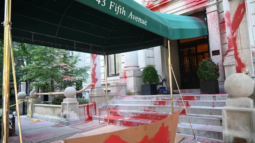 Scene of the red paint and vandalism at NYT's editor's apartment building
