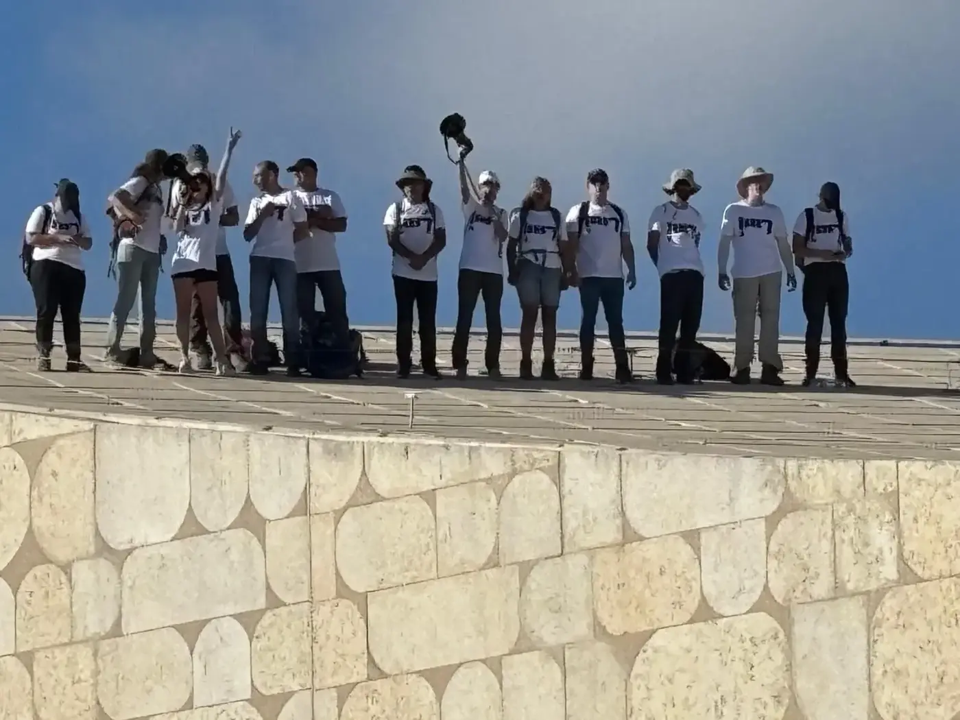 Protesters on the roof of the INL