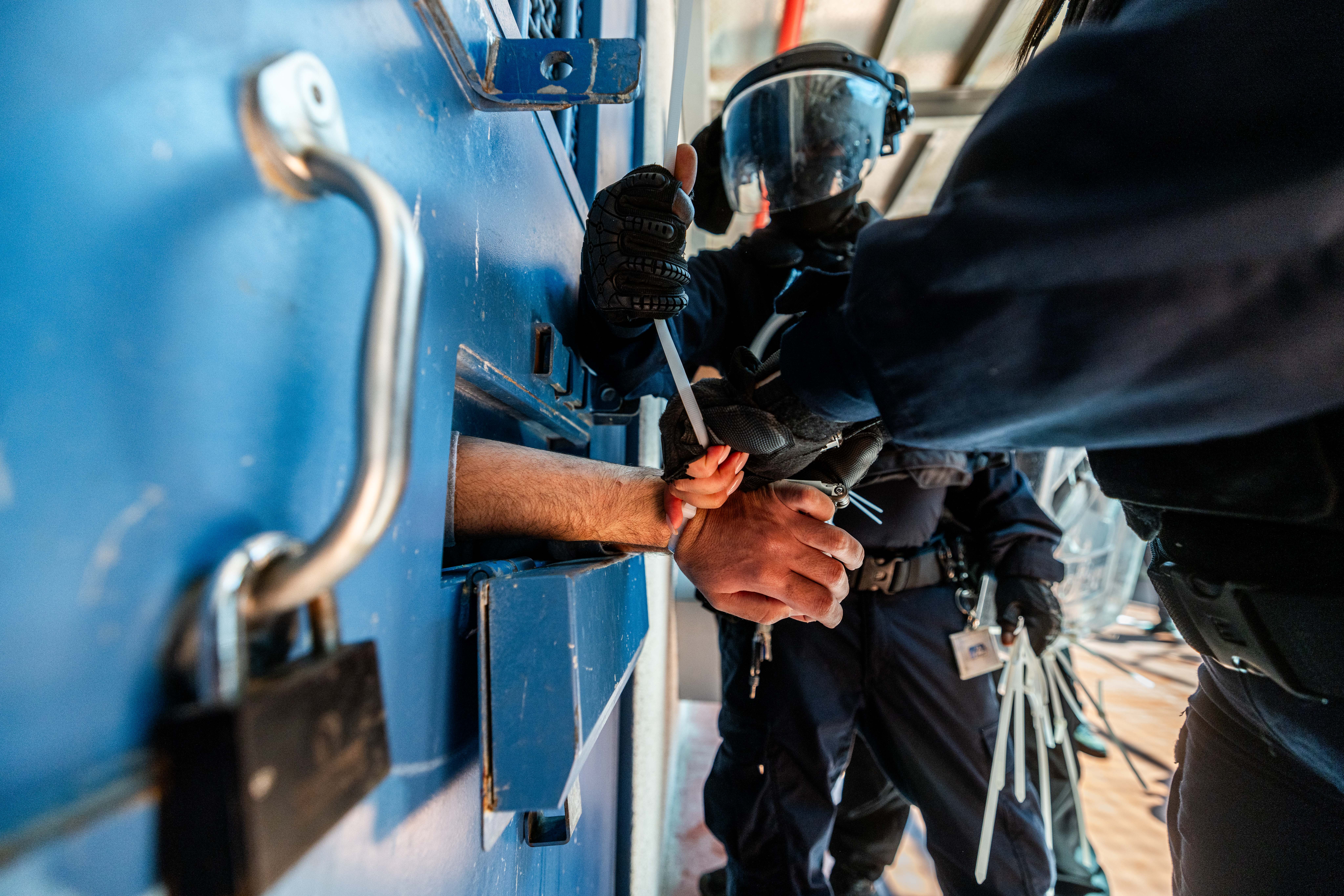 Members of the Keter unit, an Israeli prison service response unit seen during an operation where Nukhba terrorists (a Hamas unit) being held, at the Ofer Prison near Jerusalem, August 28, 2024.