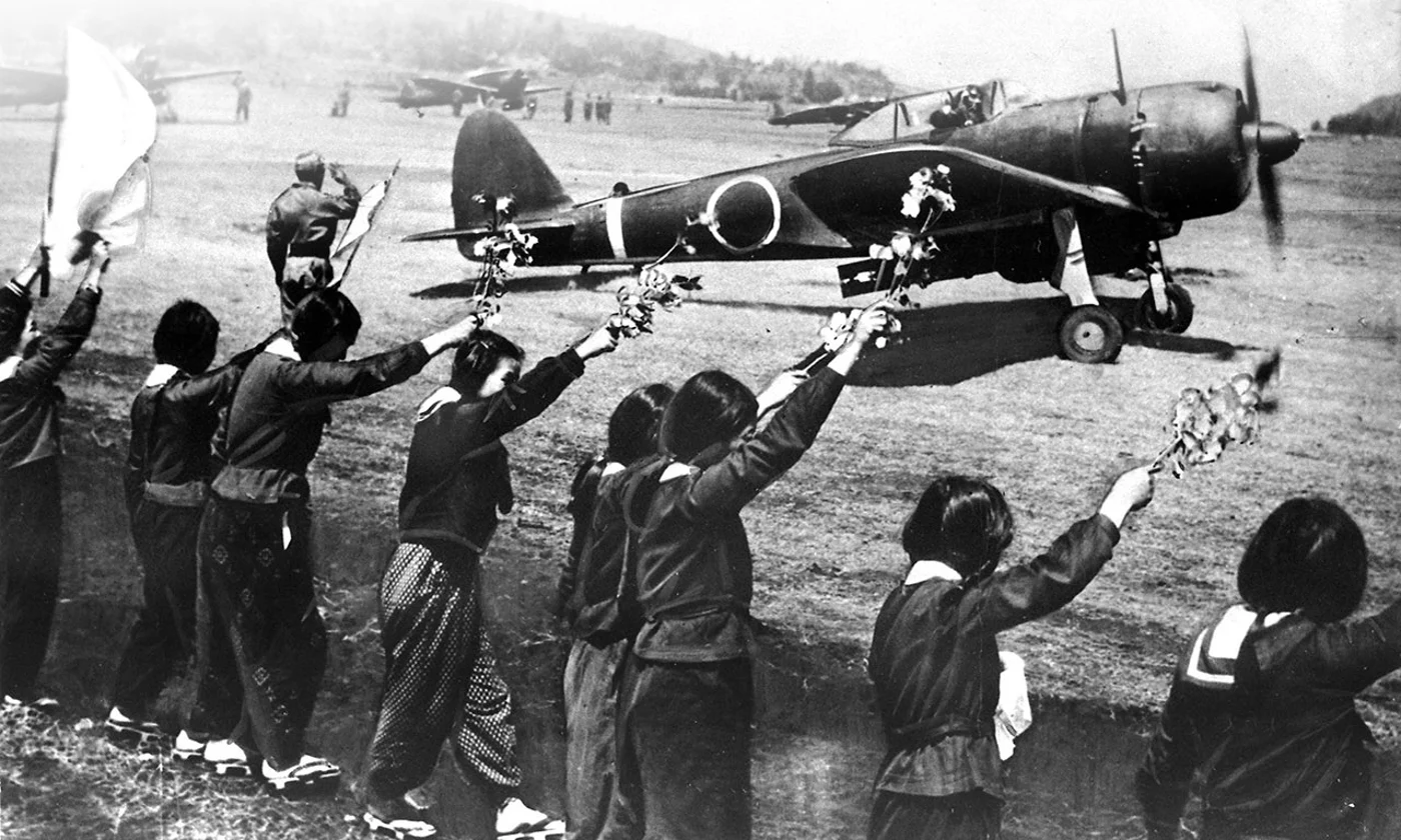 Japanese girls encouraging Kamikaze pilots