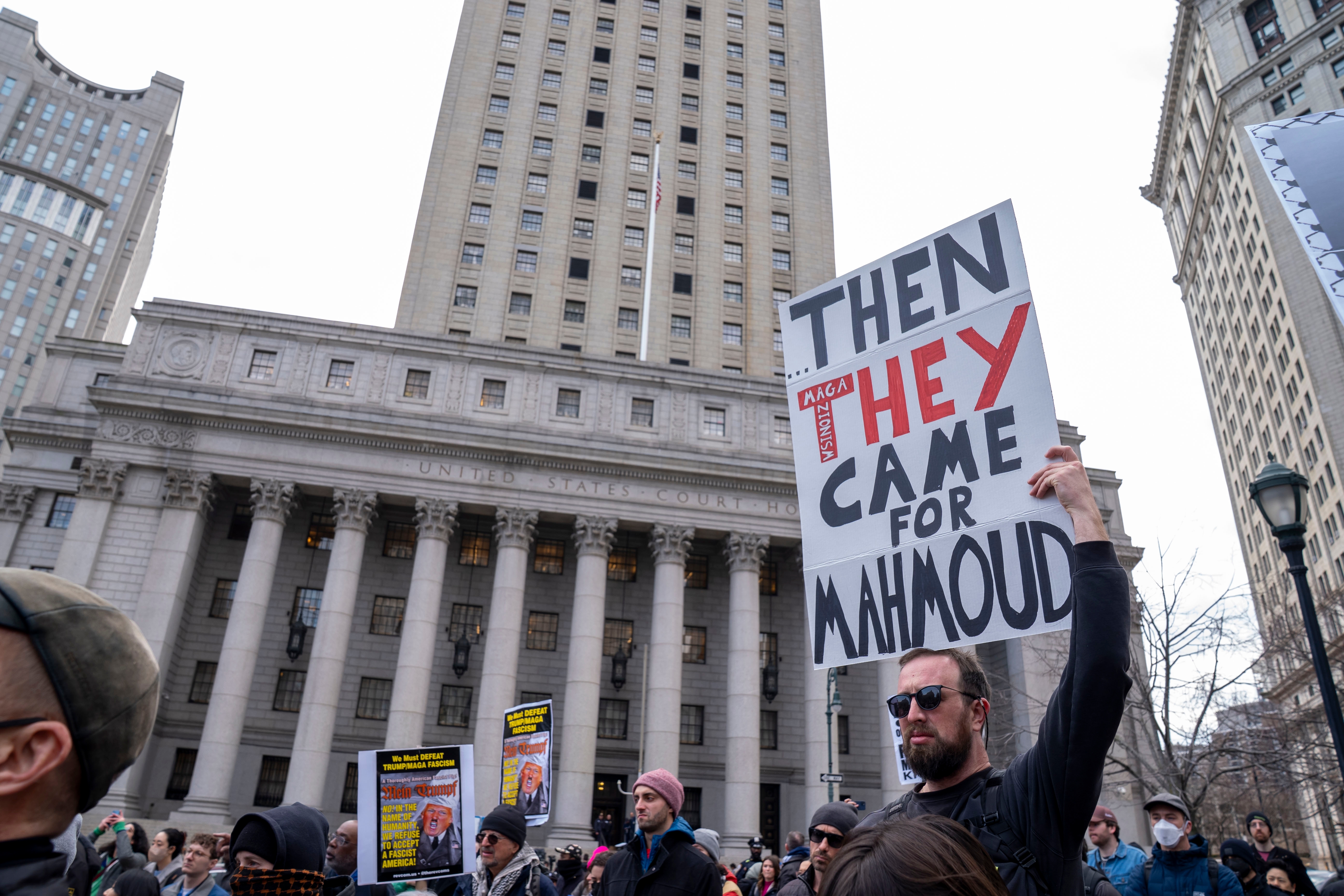 Protesters hold placards and wave Palestinian flags during a rally in support of Mahmoud Khalil at Foley Square on March 12, 2025 in New York City.