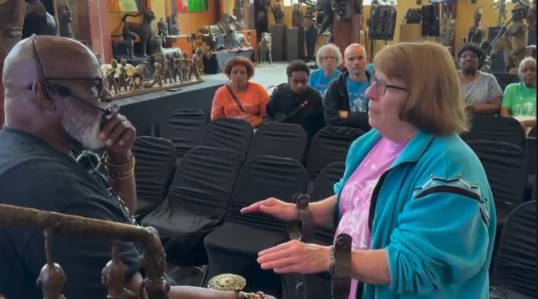 White woman weeps after being chained by black Man 