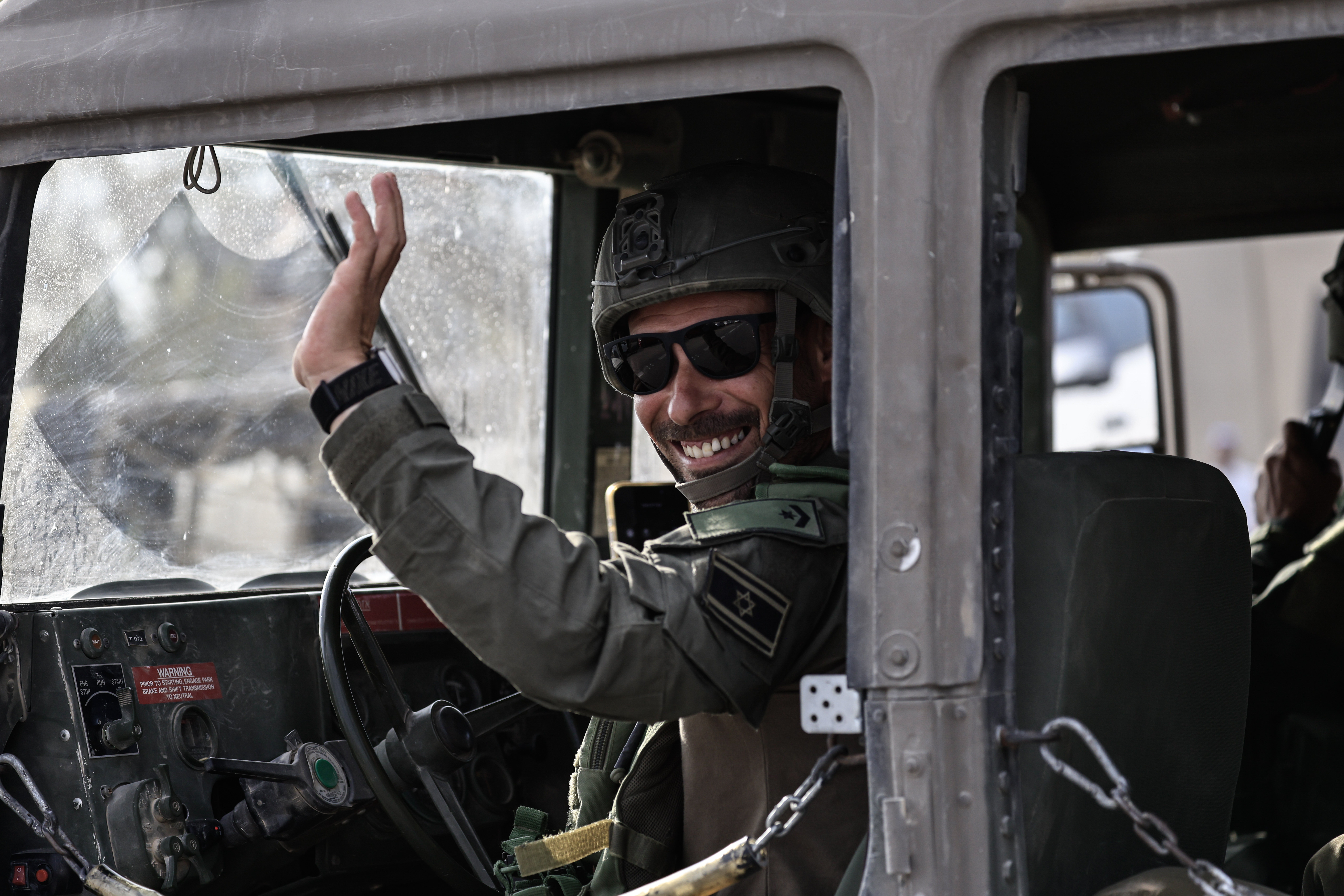 Israeli soldiers seen near the Israeli border with the Gaza Strip, October 9, 2025. 