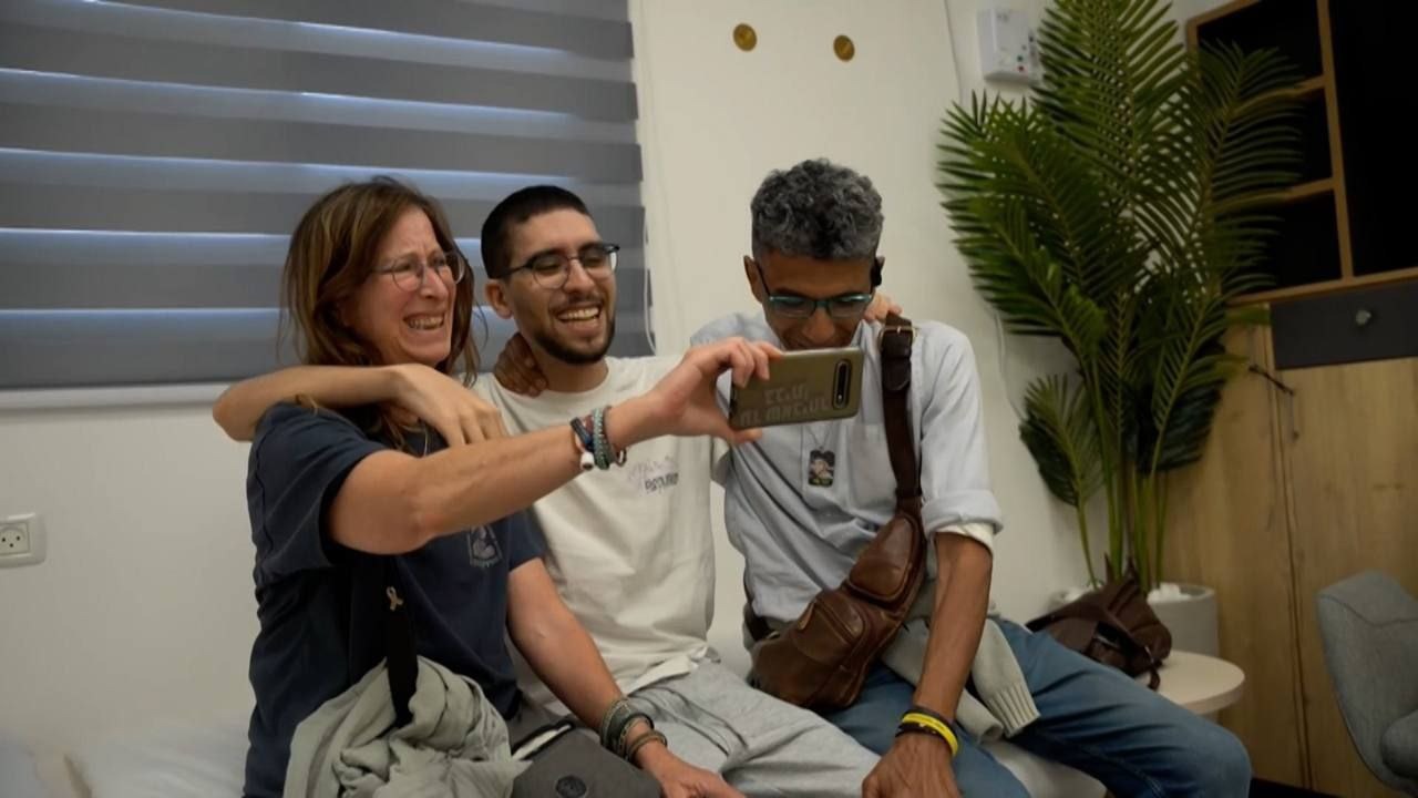 Evyatar David with his parents