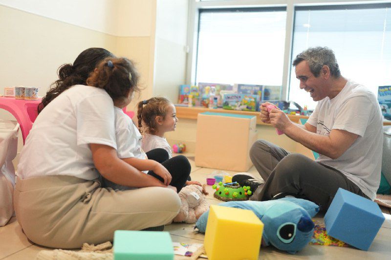 Omri and Lishay Miran and their daughters