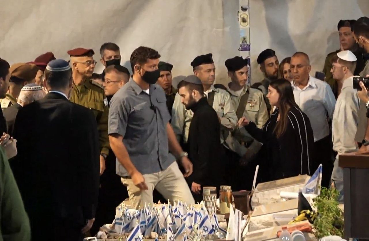 Former hostage Matan Angrest at the funeral