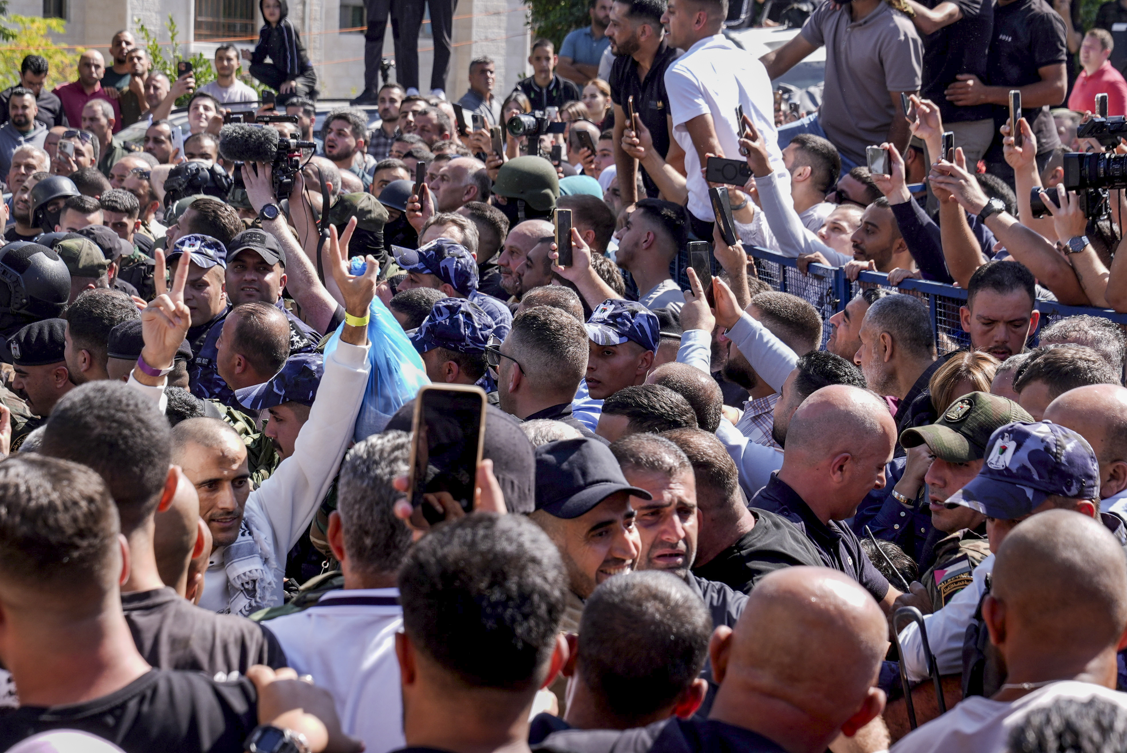 Palestinian prisoners who were released in a hostage deal between Israel and Hamas arrive in the city of Ramallah, October 13, 2025. 
