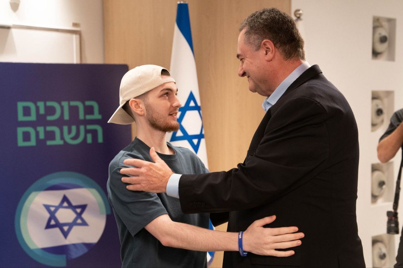 Defense Minister Israel Katz and fomer hostage Bar Kupershtein