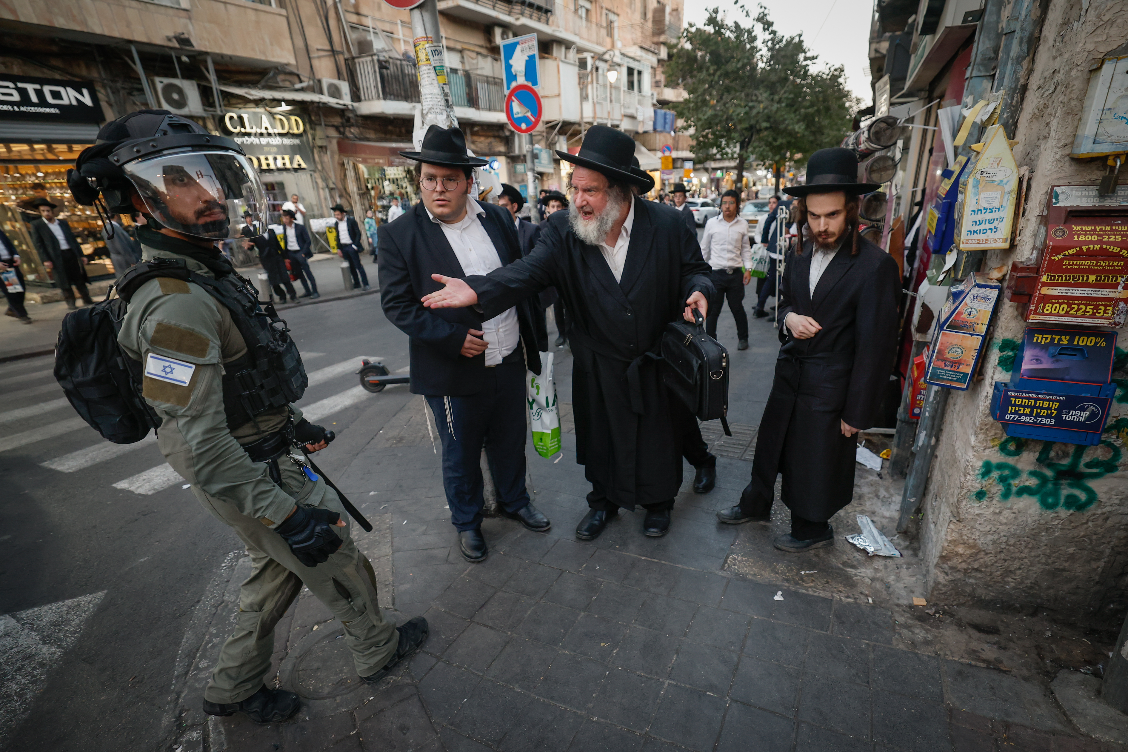 Ultra Orthodox Jewish men attend a protest against the jailing of Jewish seminary students who failed to comply with an army recruitment in Meah Shearim. October 22, 2025
