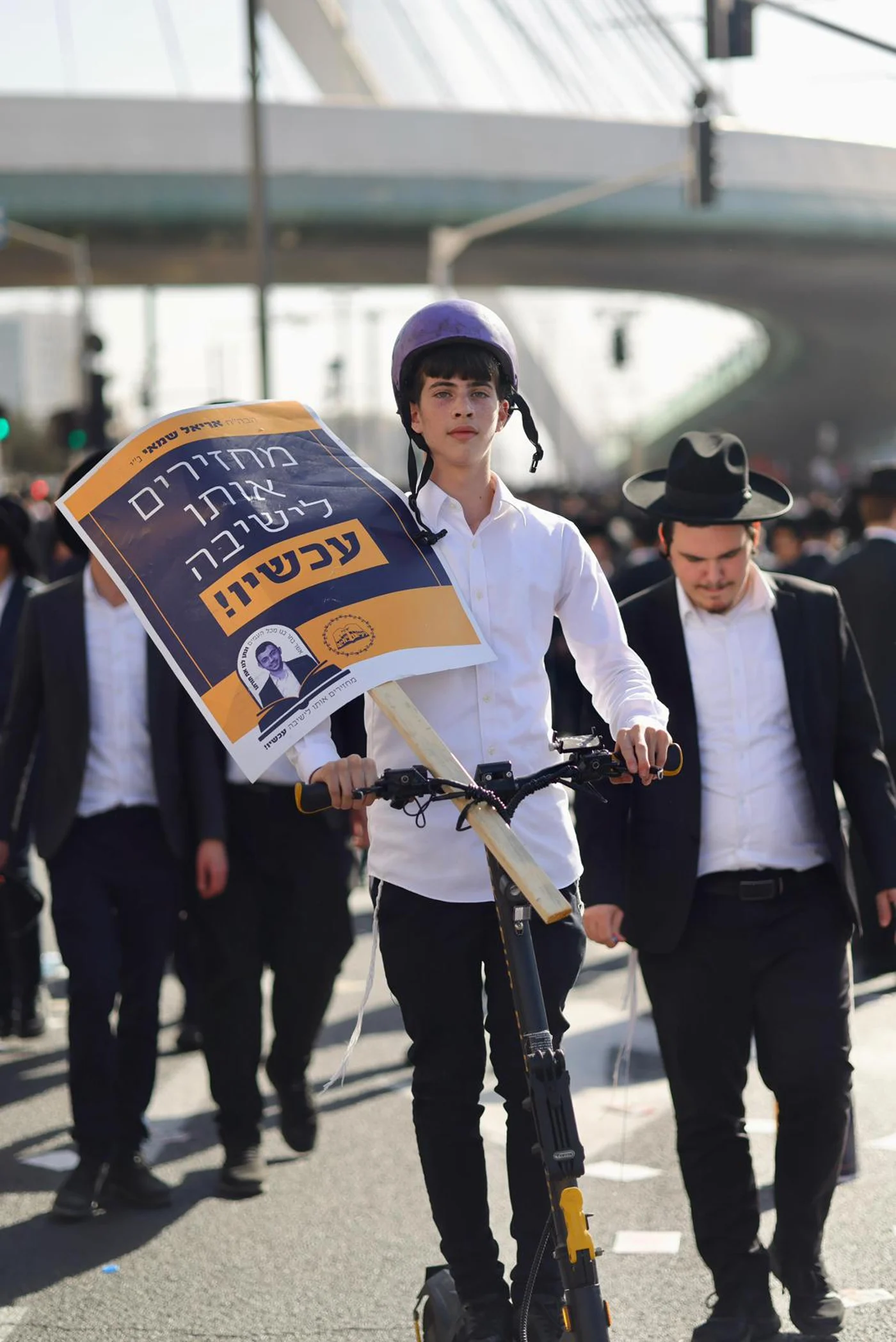 Photo: A Haredi teen attends the million man rally