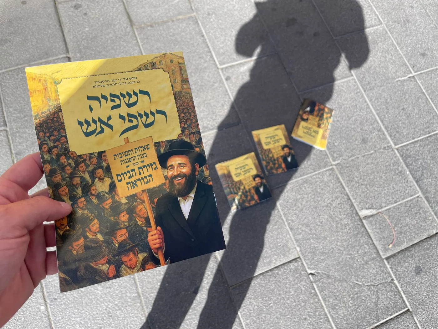 Peleg gives out flyers explaining what's happening