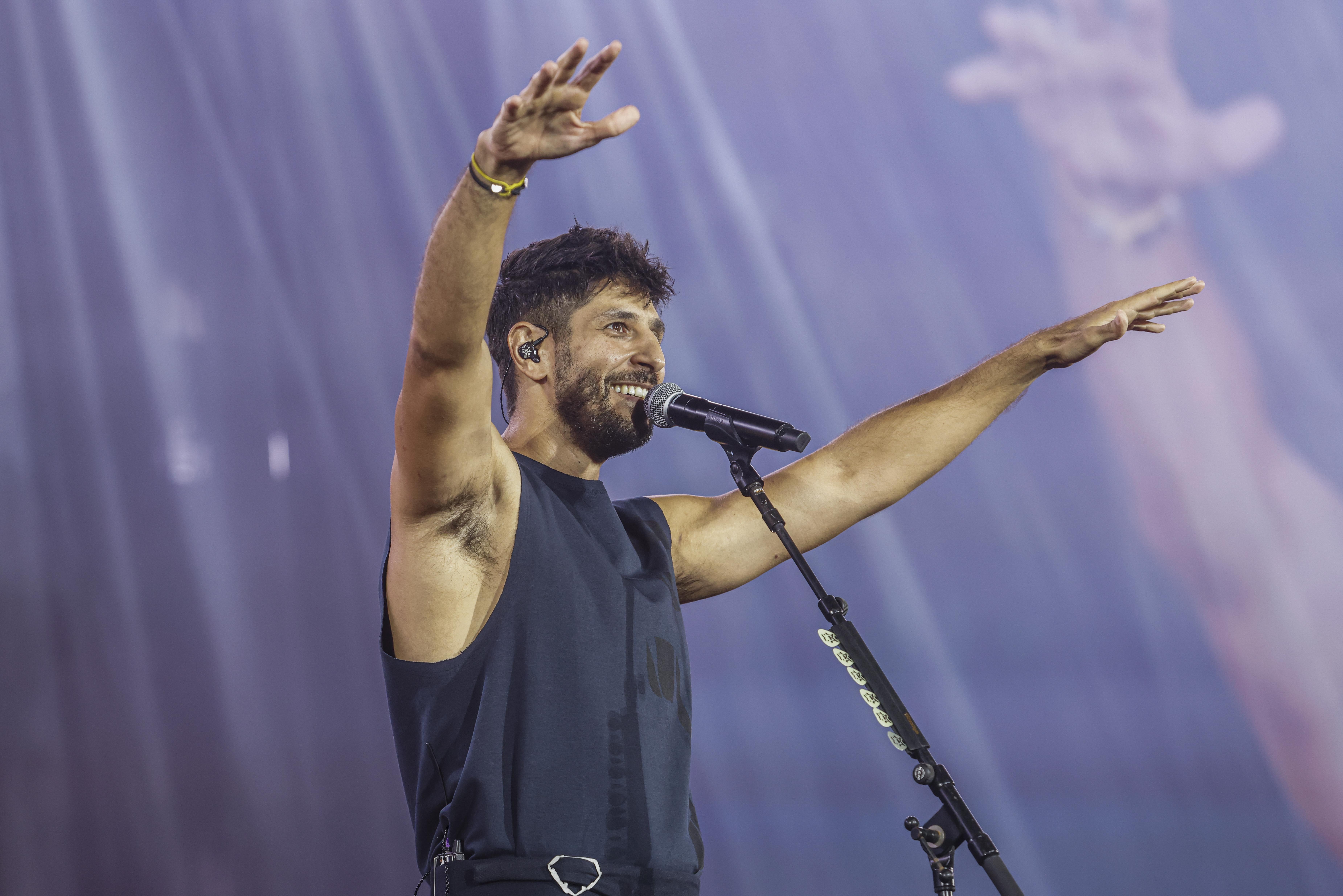 Israeli singer Idan Amedi performs live during a concert at Yarkon Park in Tel Aviv, September 9, 2025. 