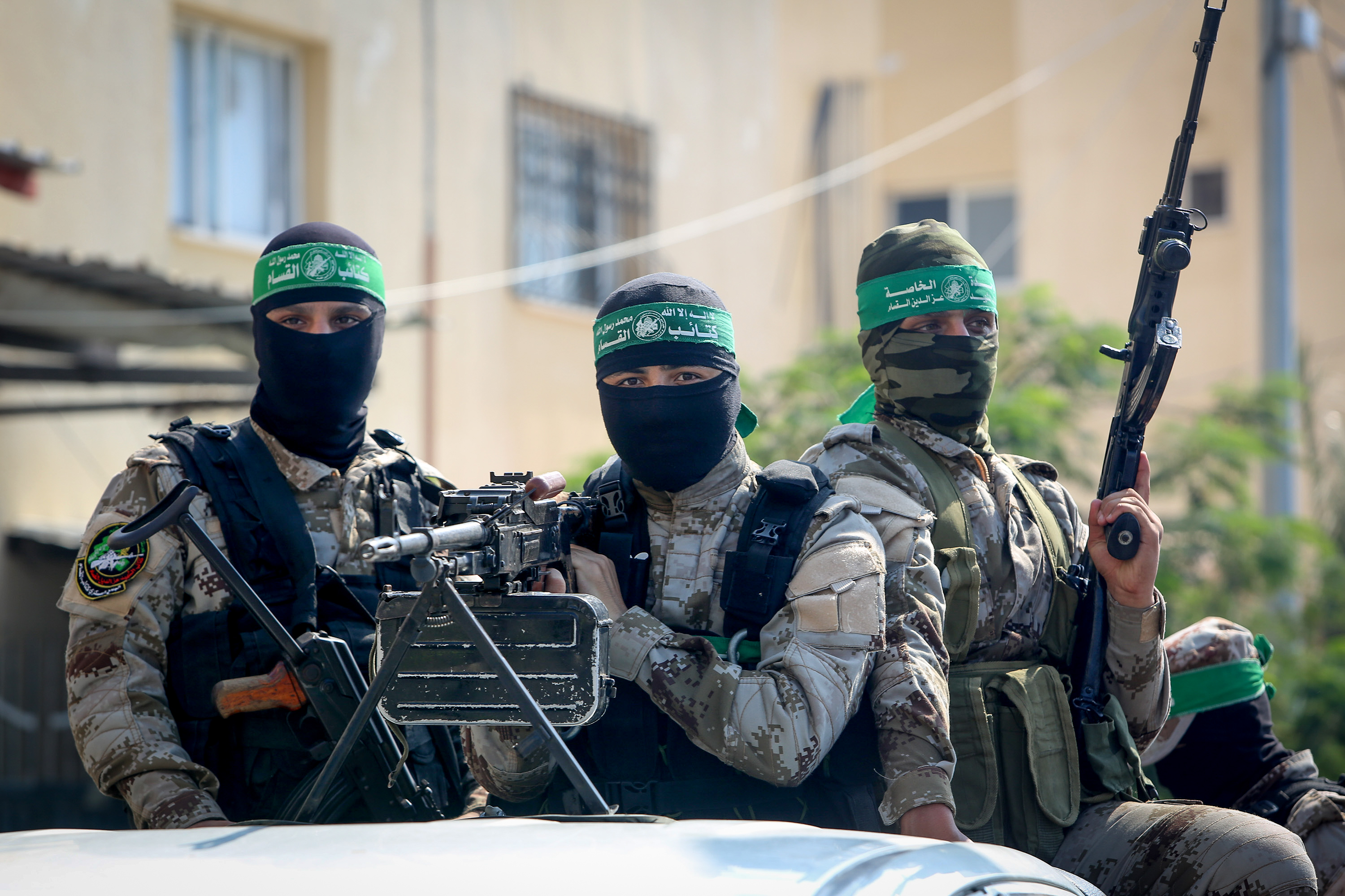 Palestinian fighters from Izz ad-Din al-Qassam Brigades attend a reception for a Palestinian prisoner "Abdel Halim Badawi" after serving 18 years in Israeli prison, in Rafah in the southern Gaza Strip, on October 17, 2019. 