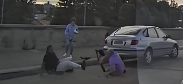 Boris and Sofia Gurman attempting to stop terrorist Sajid Akram as he emerges to begin shooting.